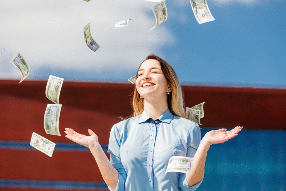Modern building exterior, woman in blue shirt, centered vertical shot, midday sun, editorial travel photo, one person.