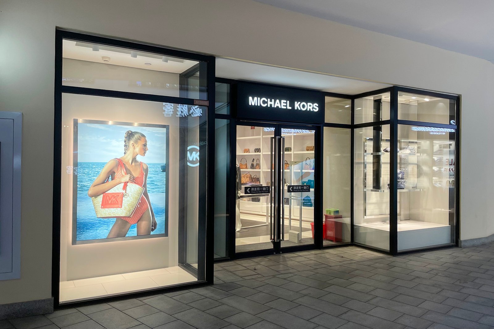 3. Michael Kors: The Uniform of Aspiration (By Windmemories, CC BY-SA 4.0)